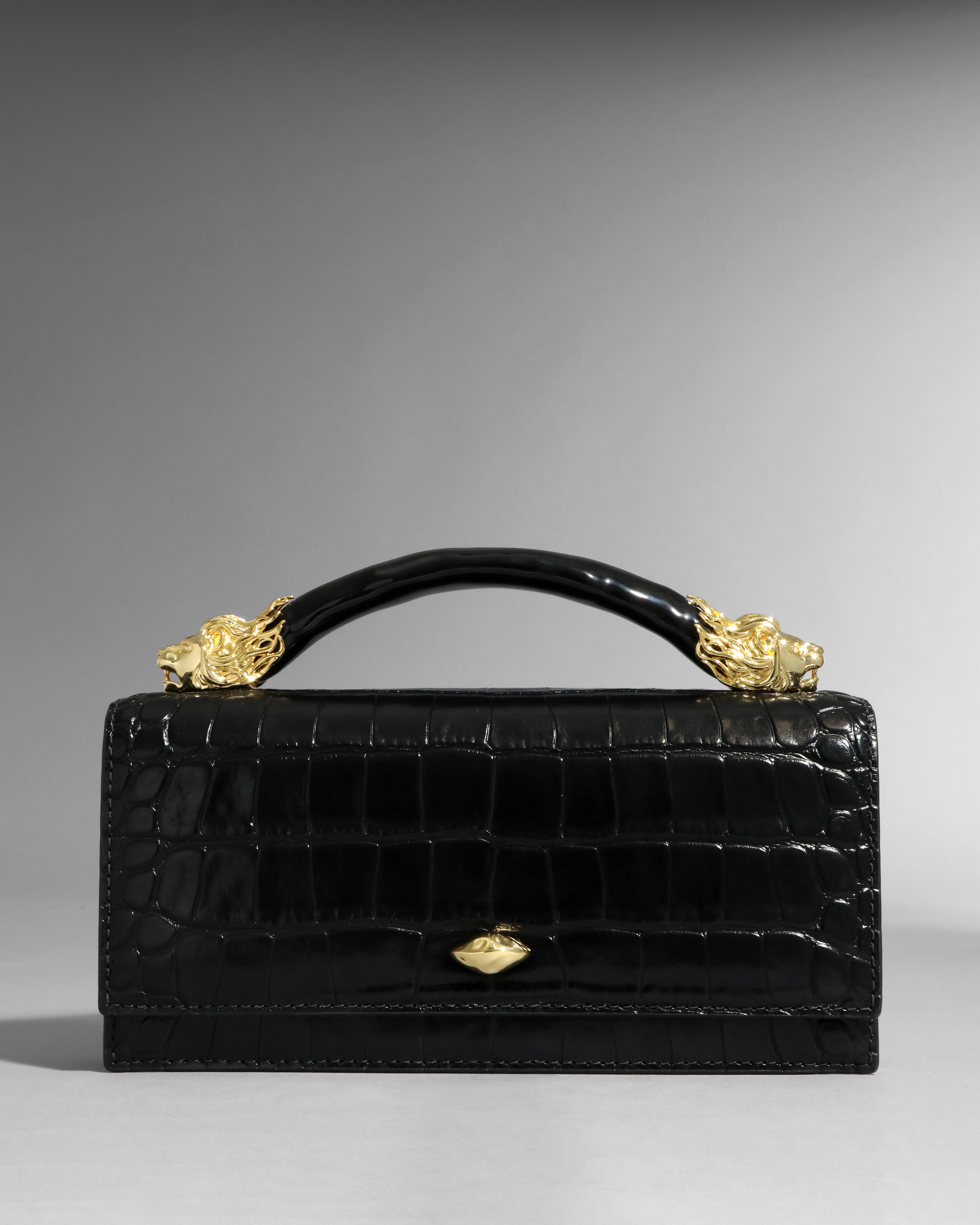 Lioness Top Handle Clutch